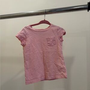 Pink tee shirt with eyelet detail